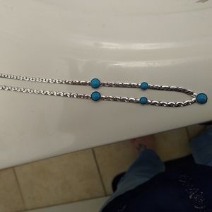 Flat silver braided necklace with turquoise